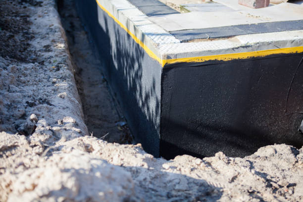 Professional Waterproofing technician working in Bowling Green, VA